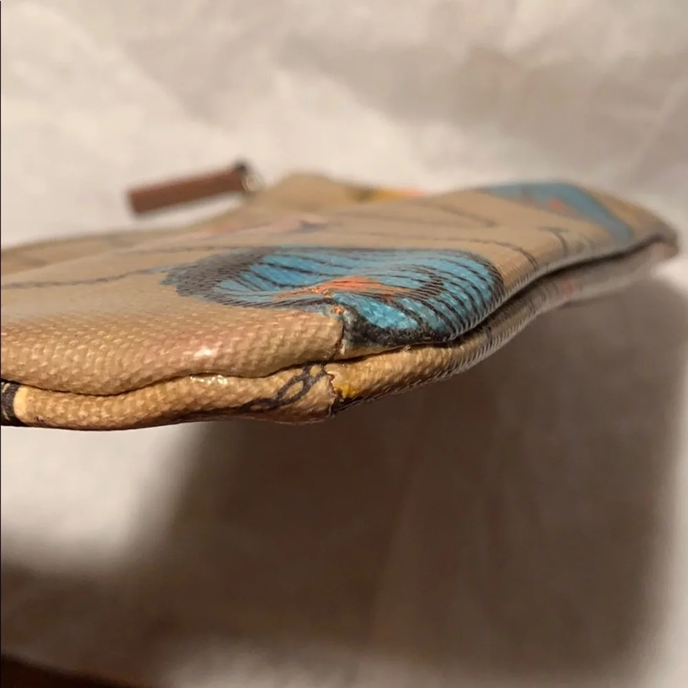 Birdcage chains cosmetic pouch